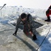 Students take plunge in icy water for Cold-Weather Operations Course 18-02 at Fort McCoy