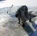 Students take plunge in icy water for Cold-Weather Operations Course 18-02 at Fort McCoy