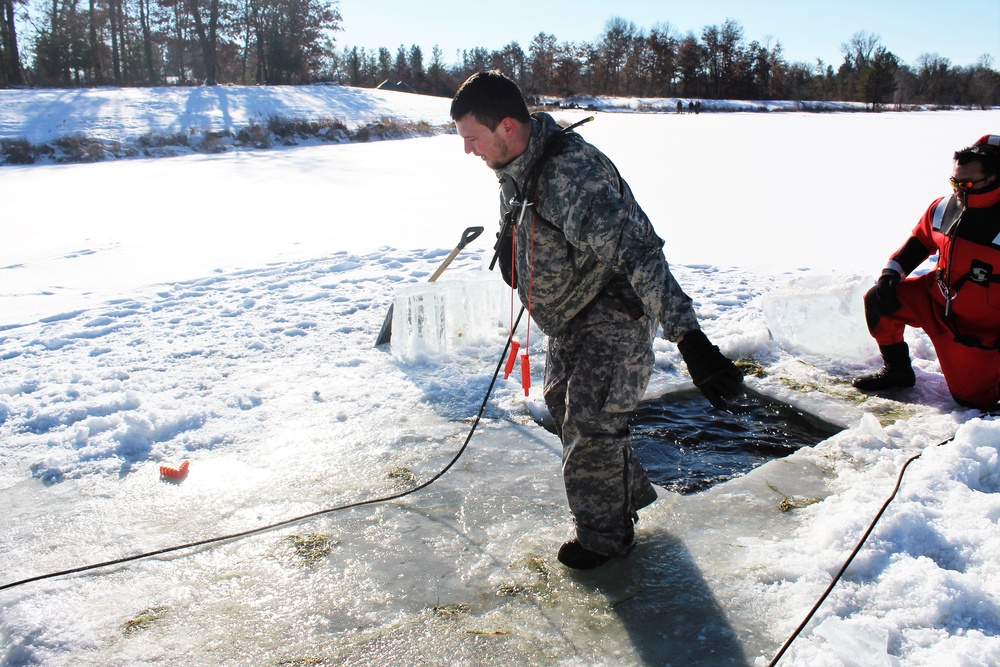 Students take plunge in icy water for Cold-Weather Operations Course 18-02 at Fort McCoy