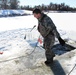 Students take plunge in icy water for Cold-Weather Operations Course 18-02 at Fort McCoy