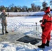 Students take plunge in icy water for Cold-Weather Operations Course 18-02 at Fort McCoy