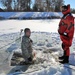 Students take plunge in icy water for Cold-Weather Operations Course 18-02 at Fort McCoy