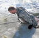 Students take plunge in icy water for Cold-Weather Operations Course 18-02 at Fort McCoy