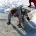 Students take plunge in icy water for Cold-Weather Operations Course 18-02 at Fort McCoy