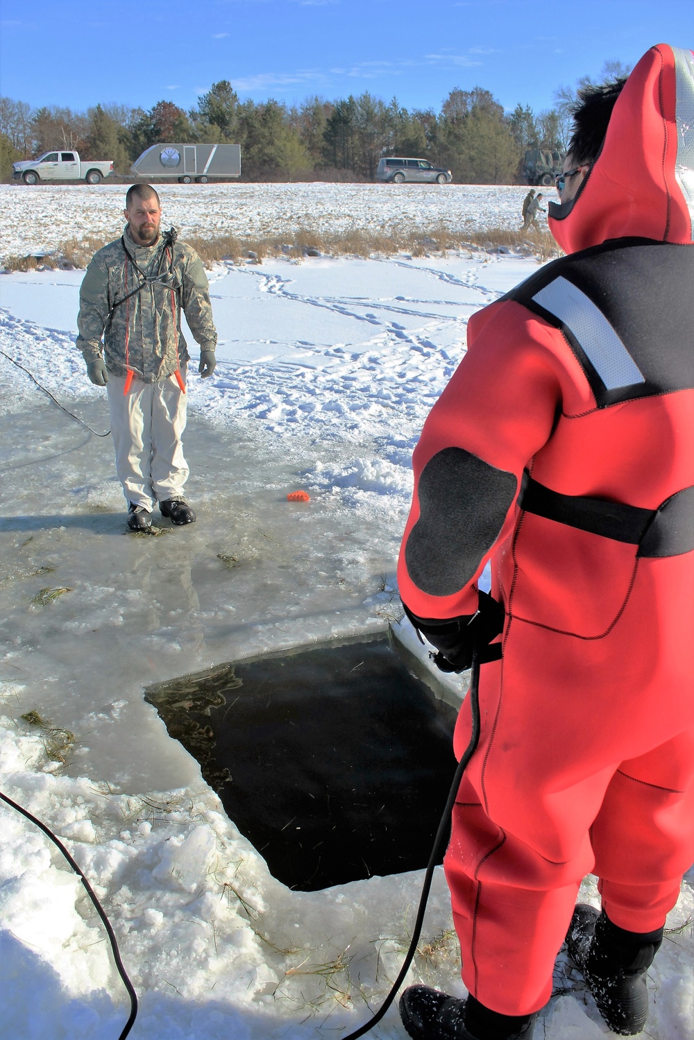 Students take plunge in icy water for Cold-Weather Operations Course 18-02 at Fort McCoy