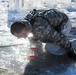 Students take plunge in icy water for Cold-Weather Operations Course 18-02 at Fort McCoy