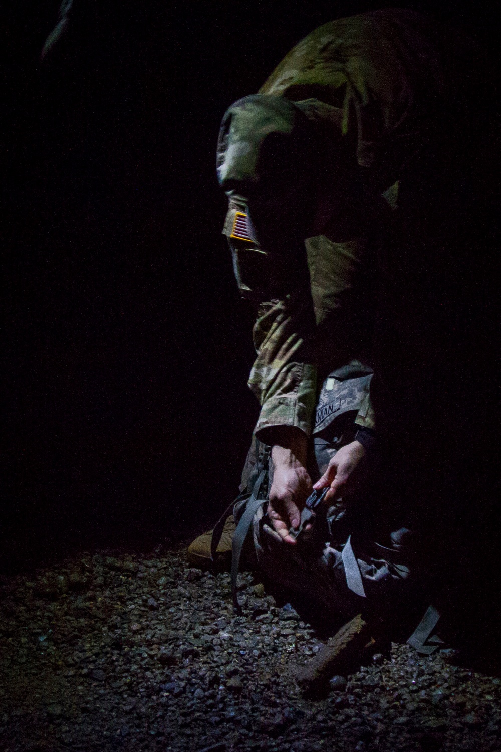 Soldier Prepares to Shoulder First Sand Bag