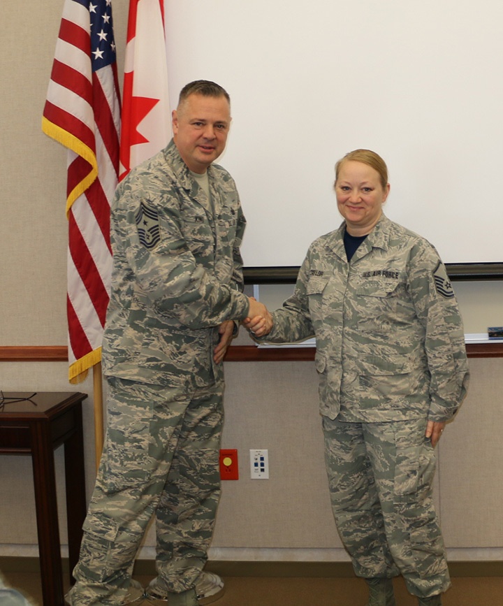 Command Chief King Coins Master Sgt. Amy Taylor