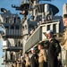 USS America mans the rails during their return to homeport