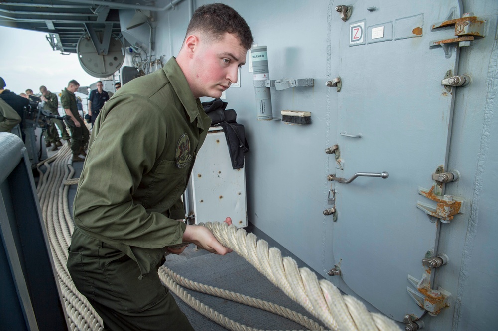 USS Bonhomme Richard conducts sea and anchor detail as it departs Okinawa