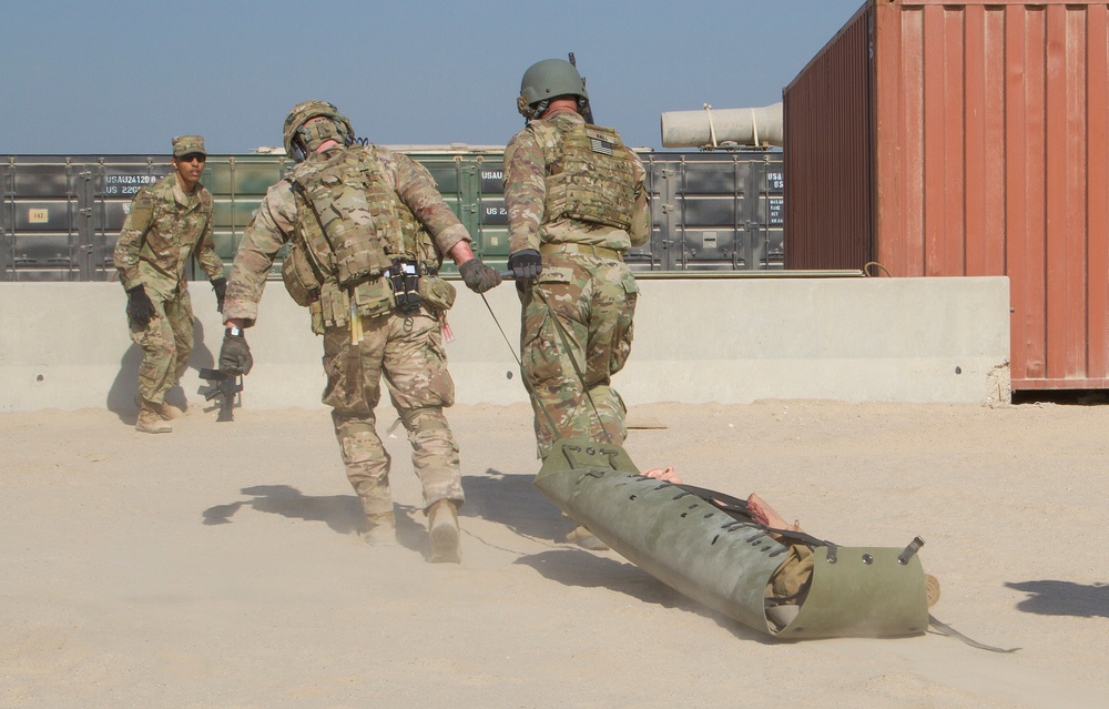 Soldiers transport simulated casualty