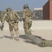 Soldiers transport simulated casualty