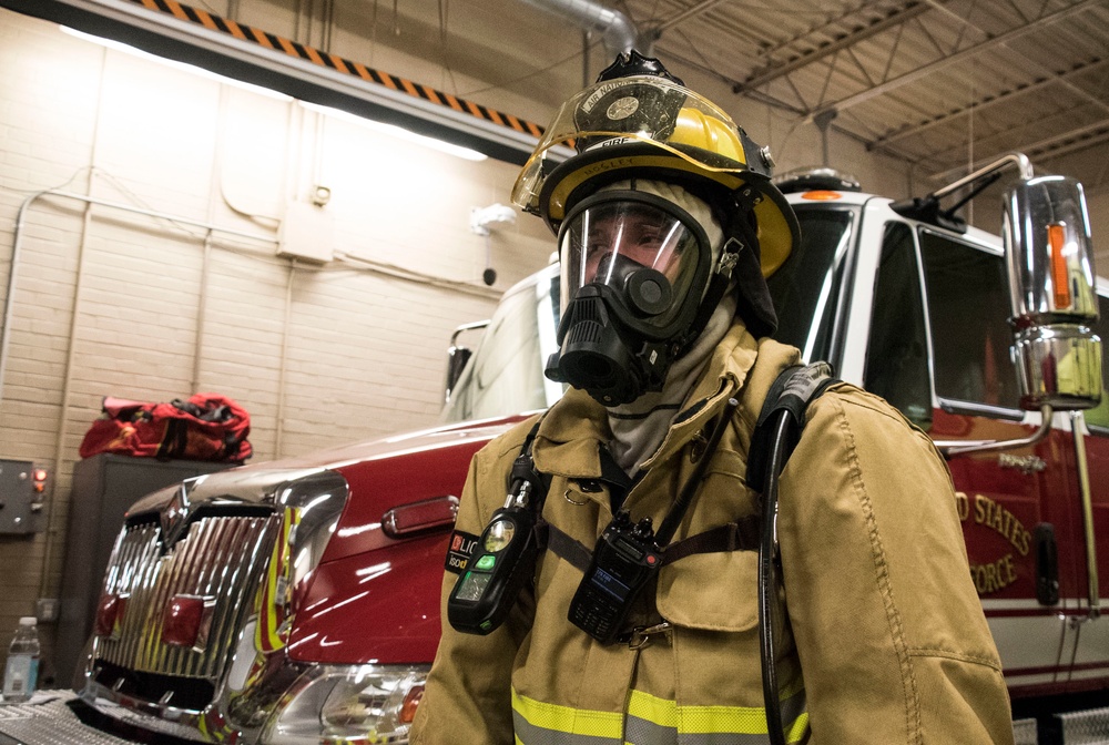 179th Airlift Wing firefighters practice Rapid Intervention Team Training