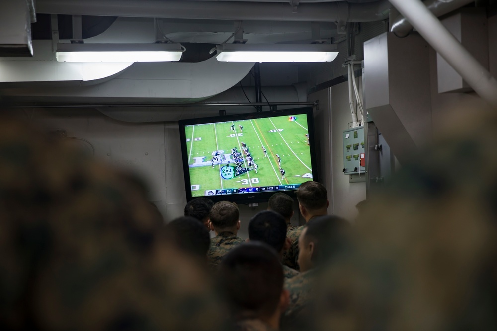 Sailors and Marines enjoy Super Bowl while deployed