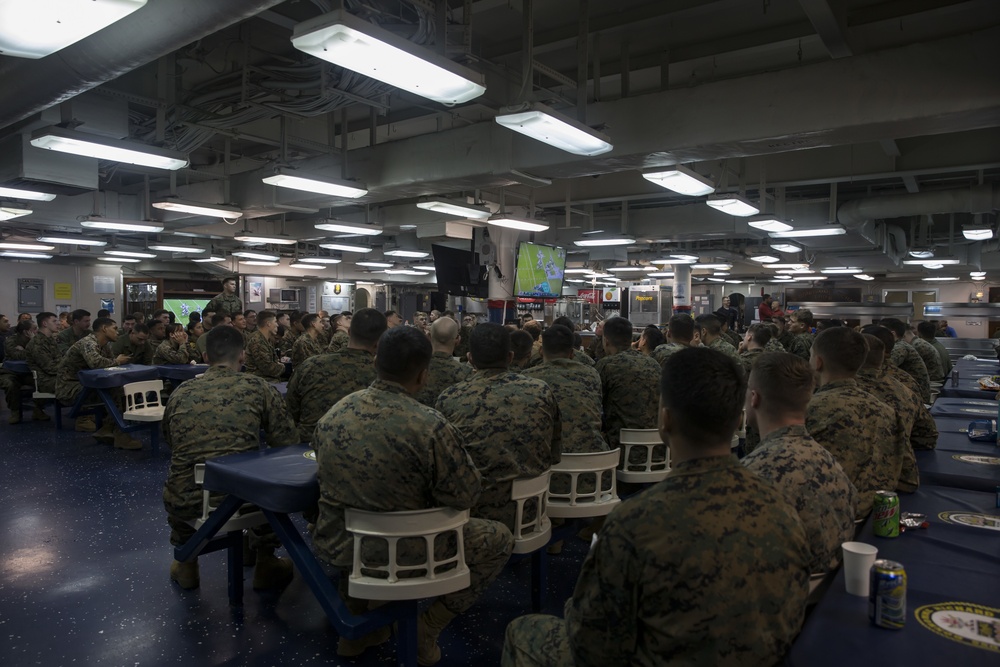 Sailors and Marines enjoy Super Bowl while deployed