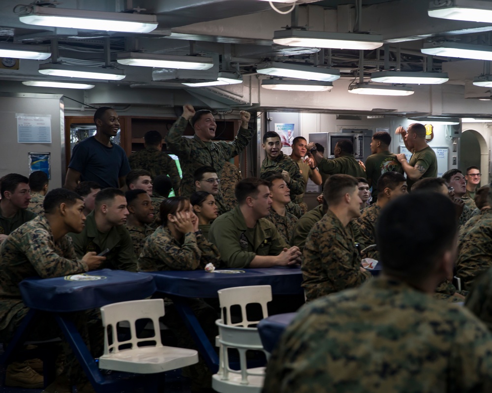 Sailors and Marines enjoy Super Bowl while deployed