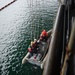 Sailors conduct man overboard drill