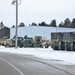 Military vehicles staged for rail movement from Fort McCoy