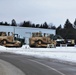 Military vehicles staged for rail movement from Fort McCoy