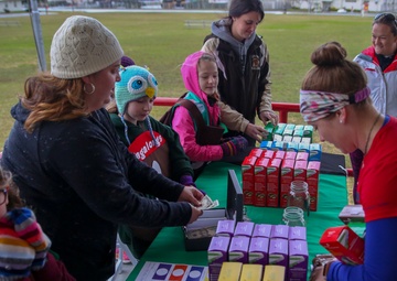 Foster Girl Scouts promote cookie sales through 5 km run