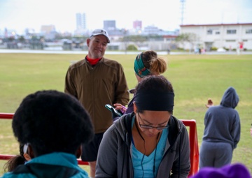 Foster Girl Scouts promote cookie sales through 5 km run