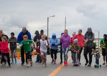 Foster Girl Scouts promote cookie sales through 5 km run