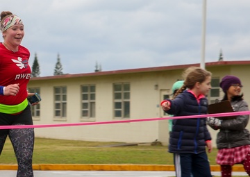 Foster Girl Scouts promote cookie sales through 5 km run