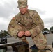 Cannon crewmembers prep howitzer for JRTC