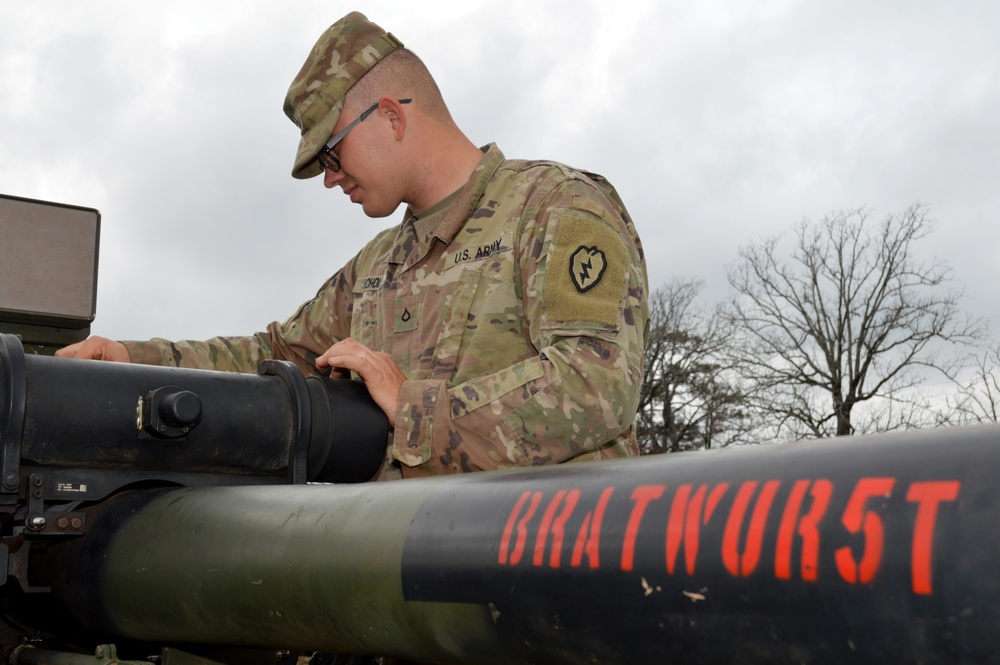 Cannon crewmembers prep howitzer for JRTC