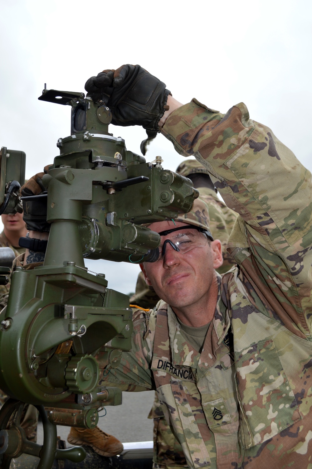 Cannon crewmembers prep howitzer for JRTC