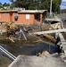 Coastal Erosion And Storm Surge Damage Home