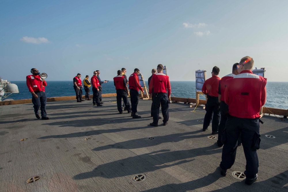 USS Bonhomme Richard (LHD 6) Sailors Qualify 9mm During Gun Shoot