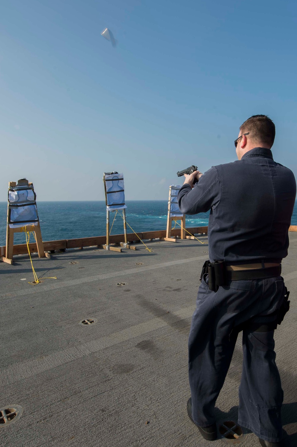 USS Bonhomme Richard (LHD 6) Sailors Qualify 9mm During Gun Shoot