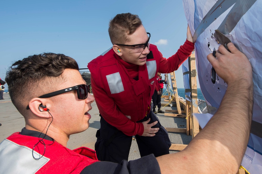 USS Bonhomme Richard (LHD 6) Sailors Qualify 9mm During Gun Shoot