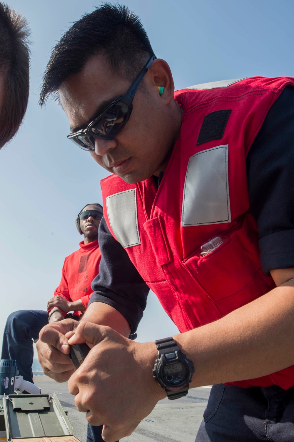 USS Bonhomme Richard (LHD 6) Sailors Qualify 9mm During Gun Shoot