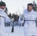 Norwegian and U.S. generals and sergeants major conduct an ice-breaking drill