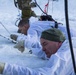 Norwegian and U.S. generals and sergeants major conduct an ice-breaking drill