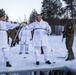 Norwegian and U.S. generals and sergeants major conduct an ice-breaking drill