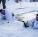 Norwegian and U.S. generals and sergeants major conduct an ice-breaking drill