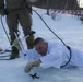 Norwegian and U.S. generals and sergeants major conduct an ice-breaking drill