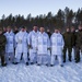 Norwegian and U.S. generals and sergeants major conduct an ice-breaking drill