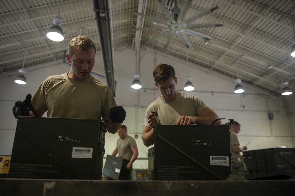 1st SOMXS Munitions Technicians inspect, package 30mm rounds