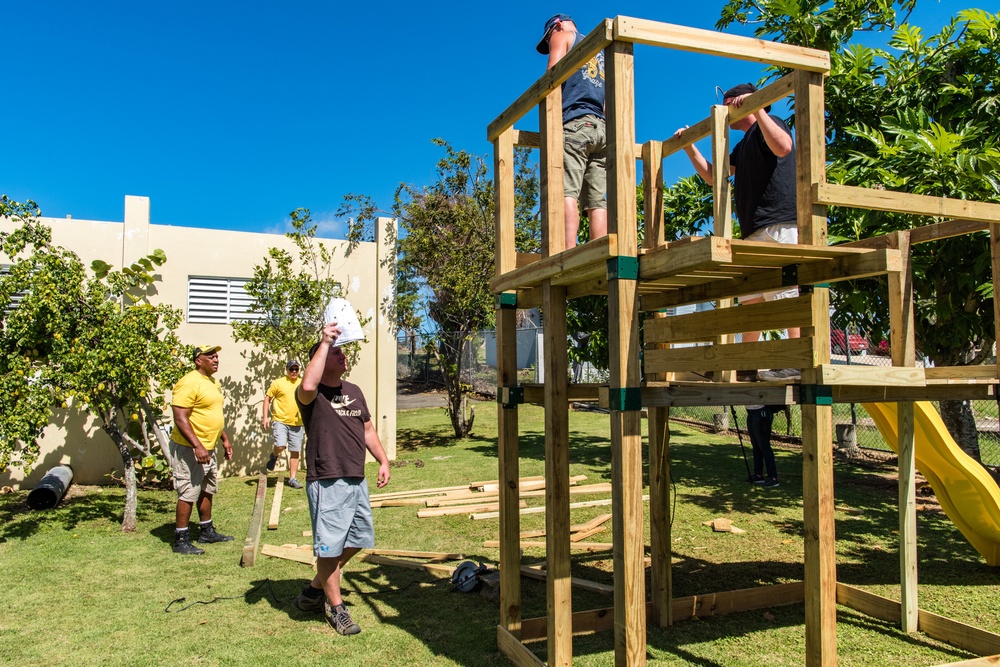 Drivers Use Free Time To Repair Home For Displaced Children