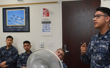 Yeoman 2nd Class Arturo Magallanes, assigned to Navy Operational Support Center (NOSC) Los Angeles, speaks to Reserve Sailors assigned to the Greater Los Angeles Area at command indoctrination during drill weekend