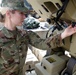 Florida Army National Guard Cadet performs maintenance on military signal equipment
