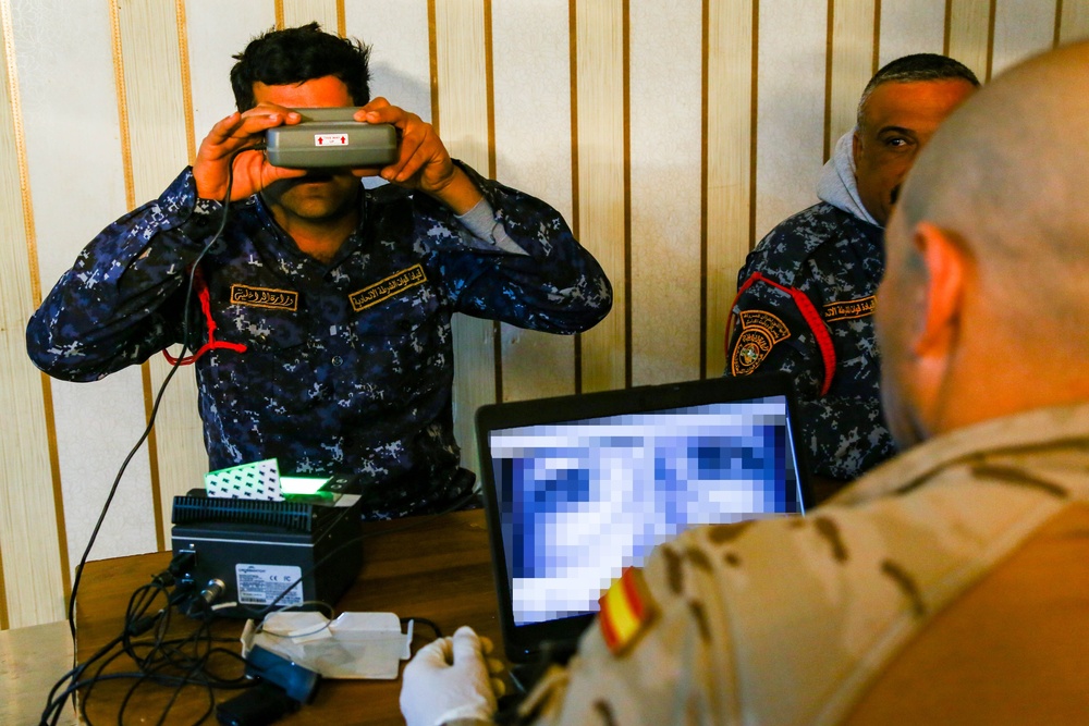 Iraqi Federal Police  enroll their biometrics into a database