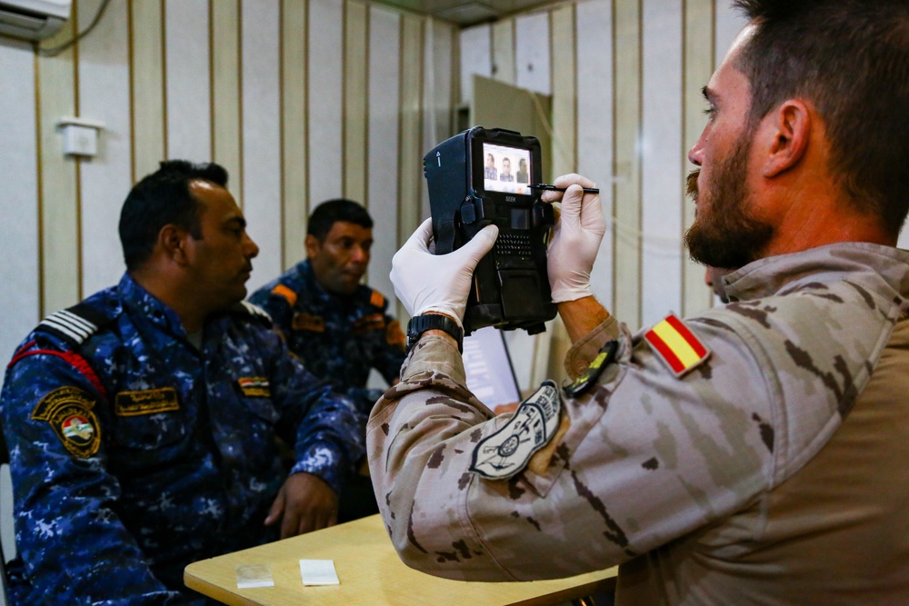 Iraqi Federal Police  enroll their biometrics into a database