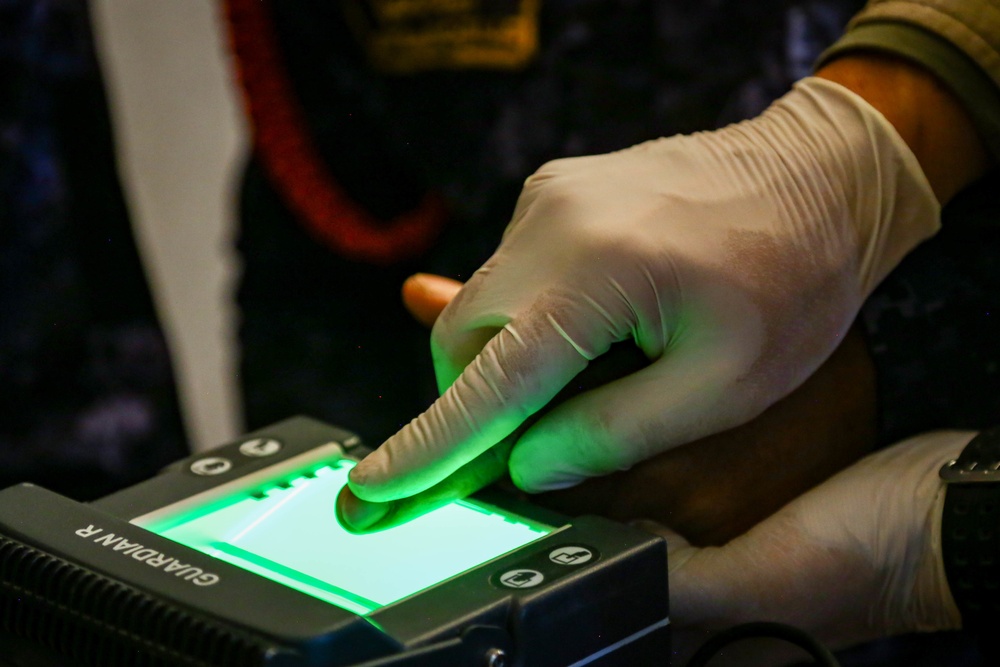 Iraqi Federal Police  enroll their biometrics into a database