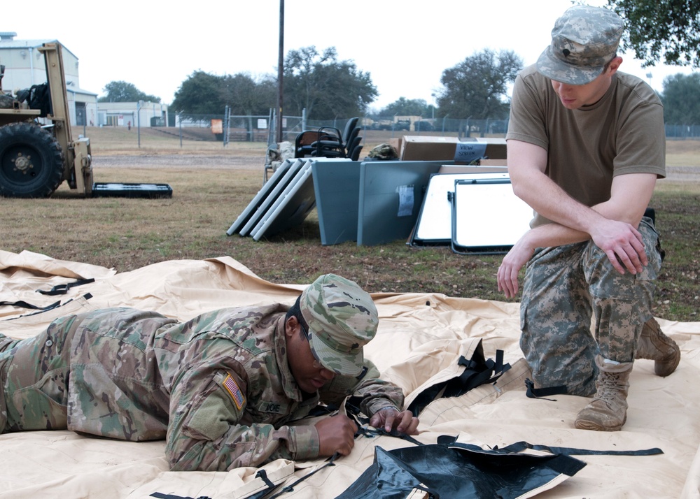 HSC set up portable field tent during drill