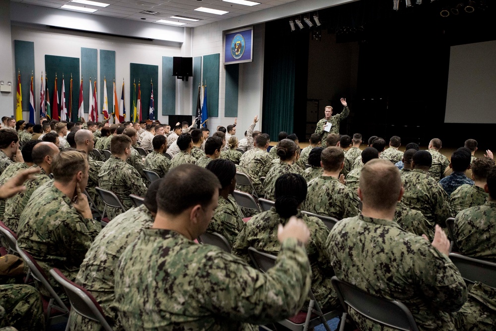 U.S. 5th Fleet Command Master Chief Russell Mason hosts an all hands call for service members stationed at Naval Support Activity Bahrain